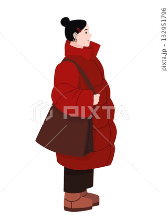 Young woman in red winter coat with brown shoulder bag and boots standing in profile isolated on white background 132951796