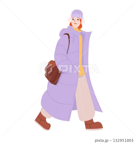 Young woman walking in winter outfit with long purple coat boots beanie and earmuffs carrying brown shoulder bag on white background Young woman walking in winter outfit with long purple coat boots beanie and earmuffs carrying brown shoulder bag on white background 132951803