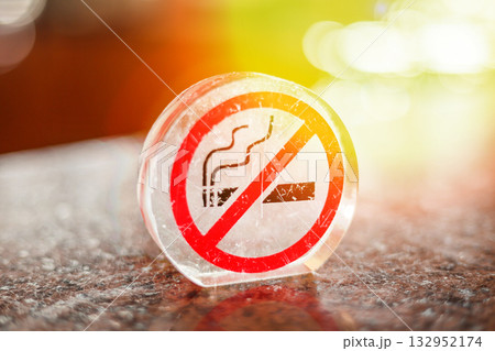 No smoking glass sign on the table No smoking glass sign on the table 132952174