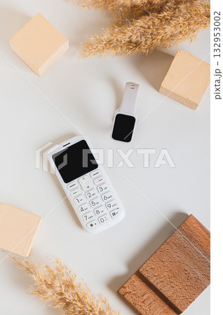 Wireless communication between a push-button telephone and a fitness bracelet top and vertical view Wireless communication between a push-button telephone and a fitness bracelet top and vertical view 132953002