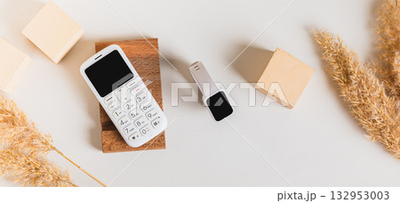 Wireless communication between a dump telephone and a fitness bracelet top view web banner 132953003