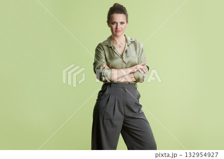 Confident Professional: Arms Crossed in Green Confident Professional: Arms Crossed in Green 132954927