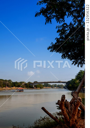 River in South America. View of the Sinu River from the Ronda del Sinu walking path on the city of Monteria. 132956322