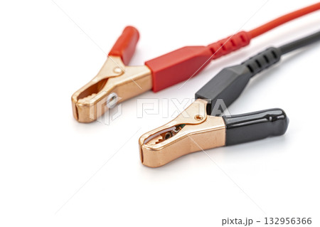 Red and Black Jumper Cable Alligator Clips Isolated on White: Essential Electrical Tools for Car Battery and Circuit Maintenance Red and Black Jumper Cable Alligator Clips Isolated on White: Essential Electrical Tools for Car Battery and Circuit Maintenance 132956366