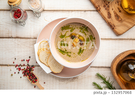 Creamy mushroom soup with croutons Creamy mushroom soup with croutons 132957068