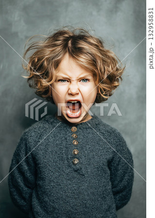 Child expresses intense anger with a fierce...のイラスト素材 [132958831] - PIXTA