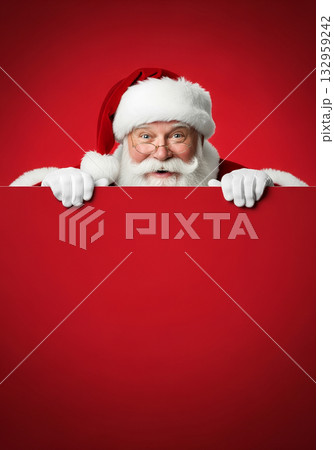 Santa Claus holding a blank red sign 132959242