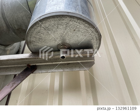 Chimney mounting system on wooden frame house 132961109