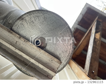 Chimney mounting system on wooden frame house 132961115