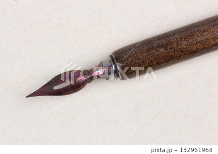 Fountain pen on an antique textured paper. Fountain pen on an antique textured paper. 132961968