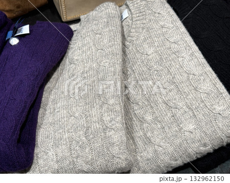 Elegant folded wool sweater on display 132962150