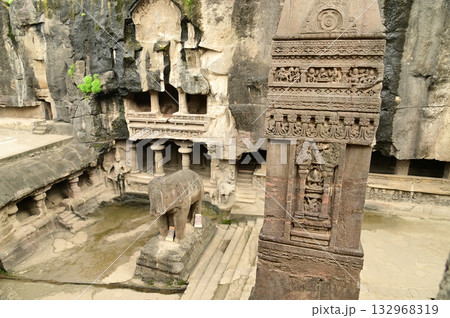 Ellora Caves, Ancient Hindu Rock Temples Ancient Hindu temples (Kailash Mandir and the chariot built to worship Lord Shiva) carved out of solid rock. Cave 16, Ellora Caves, near Aurangabad, India. 132968319