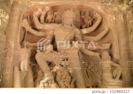 Ellora Caves, Ancient Hindu Rock Temples Ancient Hindu temples (Kailash Mandir and the chariot built to worship Lord Shiva) carved out of solid rock. Cave 16, Ellora Caves, near Aurangabad, India. Ellora Caves, Ancient Hindu Rock Temples Ancient Hindu temples (Kailash Mandir and the chariot built to worship Lord Shiva) carved out of solid rock. Cave 16, Ellora Caves, near Aurangabad, India. 132968327