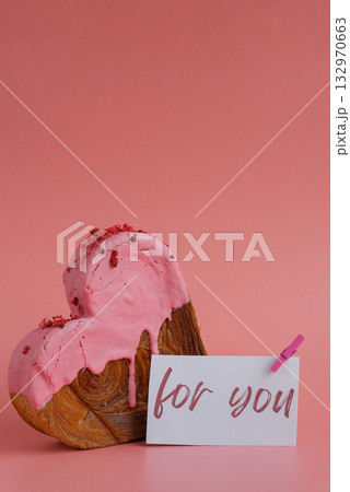 FOR YOU caption text on paper note holiday gift present Heart shaped strawberry berry croissant on pink background with copy space. Puff pastry new trendy sweet dessert bakery. Creamy dough 132970663