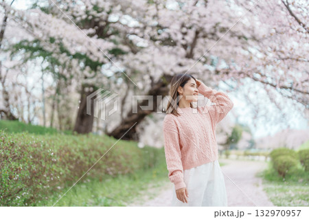 Woman tourist sightseeing Kajo Park Yamagata Castle Ruins with Sakura Cherry Blossom in Spring, happy traveler travel in Yamagata prefecture, Tohoku, Japan. famous Landmark for Travel and Vacation Woman tourist sightseeing Kajo Park Yamagata Castle Ruins with Sakura Cherry Blossom in Spring, happy traveler travel in Yamagata prefecture, Tohoku, Japan. famous Landmark for Travel and Vacation 132970957