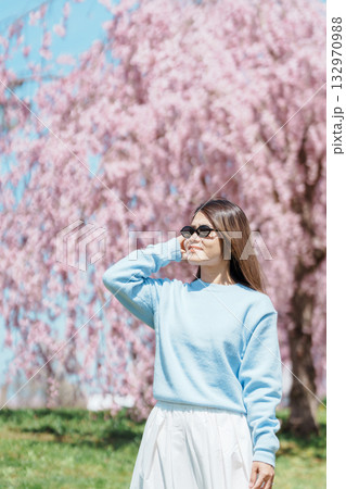 Woman tourist sightseeing Kitakami Tenshochi Park with Sakura Cherry Blossom in Spring, traveler travel in Kitakami festival, Iwate prefecture, Japan. Landmark for Travel and Vacation destination Woman tourist sightseeing Kitakami Tenshochi Park with Sakura Cherry Blossom in Spring, traveler travel in Kitakami festival, Iwate prefecture, Japan. Landmark for Travel and Vacation destination 132970988