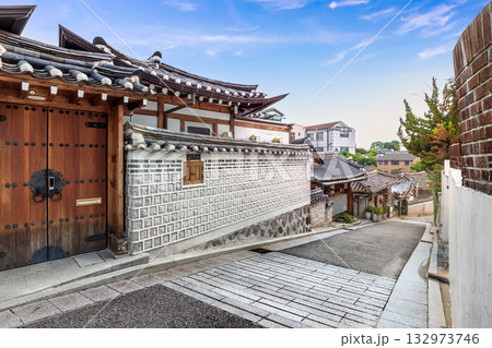 Traditional wooden door and entrance facade of a Hanok house within Bukchon Hanok Village, a famous cultural travel landmark of South Korea 132973746