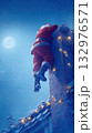 Santa climbing into snowy chimney under full moon 132976571