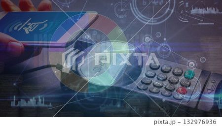 Holding smartphone over payment terminal at checkout, showing holographic pie chart and data nodes 132976936
