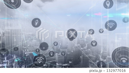 Floating network icons linking skyscraper cluster at downtown aerial view, glowing digital overlay 132977016
