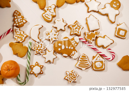 Festive Gingerbread Cookies With Icing and Candy Canes for Christmas 132977585