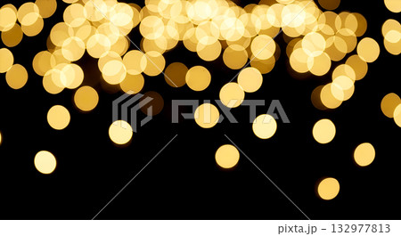 Gold bokeh abstract background, golden blurred lights, christmas glitter, festive holiday texture, new year party, shiny sparkling overlay, isolated on black 132977813