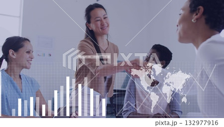 Shaking Asian professional extending hand to seated colleague in conference room, with data overlay Shaking Asian professional extending hand to seated colleague in conference room, with data overlay 132977916