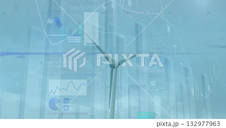 Standing wind turbine displaying chart overlays over coastal horizon, with financial data panels 132977963
