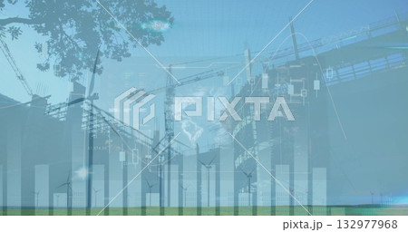 Erecting tower cranes lifting building frame on plain, with wind turbines, chart and map overlays Erecting tower cranes lifting building frame on plain, with wind turbines, chart and map overlays 132977968