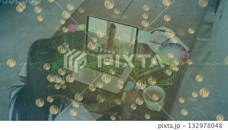 Collaborating woman using laptop at home desk, with color wheel and smartphone, bitcoin overlay Collaborating woman using laptop at home desk, with color wheel and smartphone, bitcoin overlay 132978048