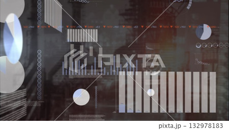 Displaying HUD-style dashboard showing data graphs in industrial backdrop, with bar and pie charts 132978183