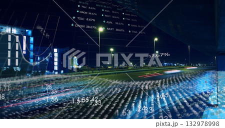 Displaying urban highway with blurred red light trails by street lamps at night with data overlays 132978998