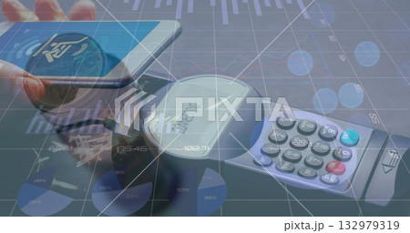 Displaying smartphone using POS terminal at checkout, showing bar, line and pie chart overlays 132979319