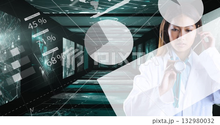 Doctor wearing lab coat holding stethoscope in data corridor, with pie charts, copy space 132980032