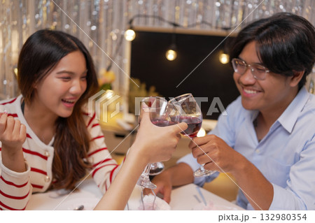 Group of Friends Celebrating Birthday Party with Cake and Gifts Group of Friends Celebrating Birthday Party with Cake and Gifts 132980354