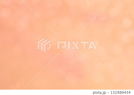 オレンジカラー系の大小ランダムなキラキラ背景素材 132980434