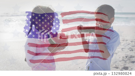 Siblings wearing dress and blue shirt holding green apples on beach, with American flag overlay Siblings wearing dress and blue shirt holding green apples on beach, with American flag overlay 132980824