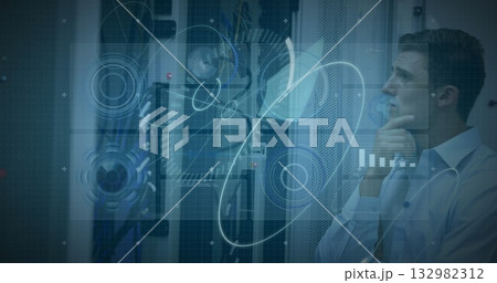 Analyzing data overlays, technician in light shirt in server room with racks, cables, copy space 132982312