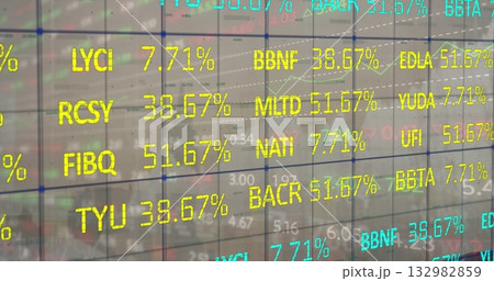 Displaying glass panel overlaying grid on trading floor, showing ticker codes and percentage data 132982859