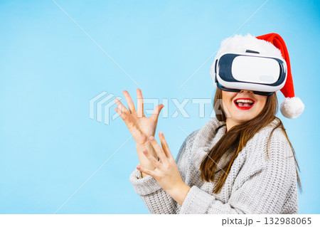 Girl watching 3d film tour in virtual reality glasses. Girl watching 3d film tour in virtual reality glasses. 132988065