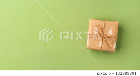 A Christmas gift wrapped in eco-friendly packaging A Christmas gift wrapped in eco-friendly packaging 132989801