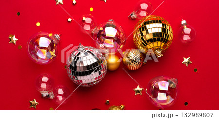 Christmas ornaments on a red background. 132989807