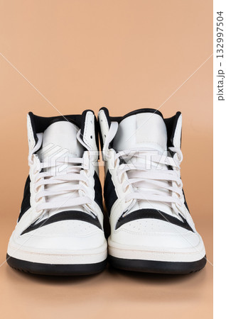 Pair of black white casual sport shoes 132997504