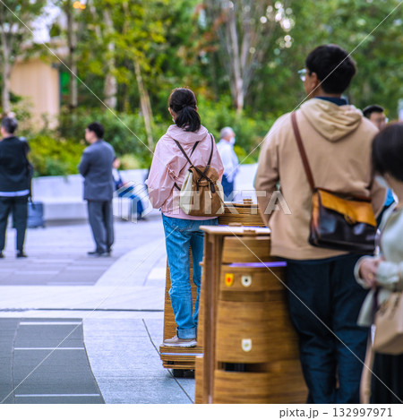日本の東京都市景観高輪ゲートウェイ駅前の高輪ゲートウェイシティの自動走行モビリティなどを望む=10日 日本の東京都市景観高輪ゲートウェイ駅前の高輪ゲートウェイシティの自動走行モビリティなどを望む=10日 132997971