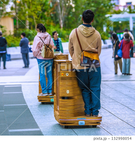 日本の東京都市景観高輪ゲートウェイ駅前の高輪ゲートウェイシティの自動走行モビリティなどを望む=10日 日本の東京都市景観高輪ゲートウェイ駅前の高輪ゲートウェイシティの自動走行モビリティなどを望む=10日 132998054