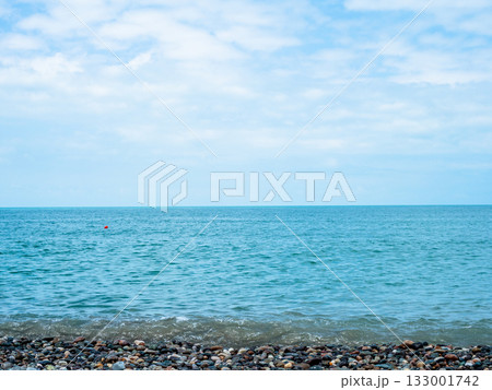 view of Black Sea water from pebble beach, Batumi 133001742
