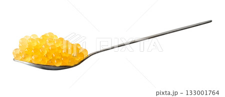 side view of trout yellow caviar in spoon cutout side view of trout yellow caviar in spoon cutout 133001764