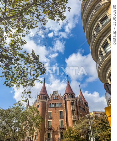 Beautiful Castle-Like Red Brick Building with Towers and Green Trees Beautiful Castle-Like Red Brick Building with Towers and Green Trees 133001880