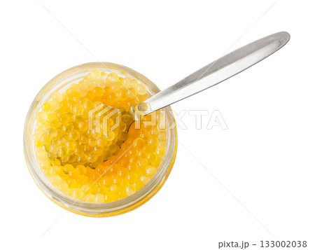 yellow caviar of trout in jar with spoon cutout yellow caviar of trout in jar with spoon cutout 133002038