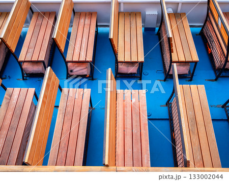 empty wooden benches on board of tour boat empty wooden benches on board of tour boat 133002044